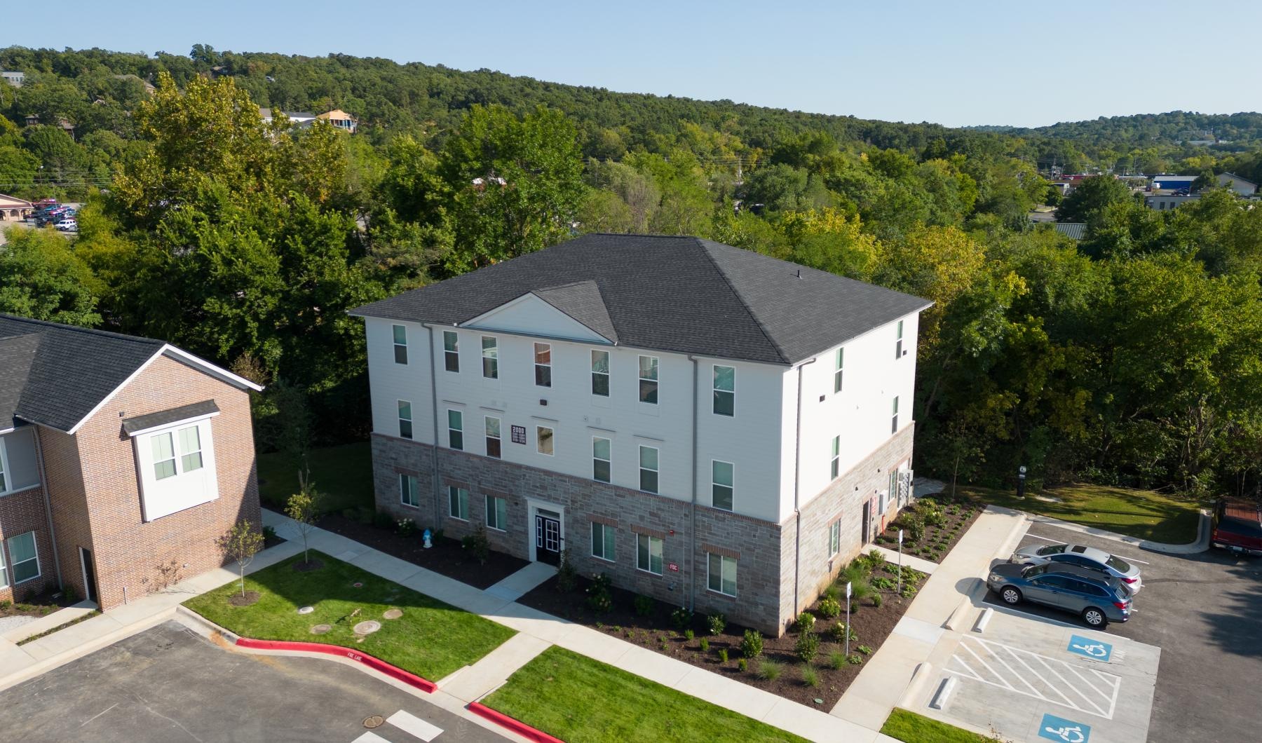 a building with a parking lot